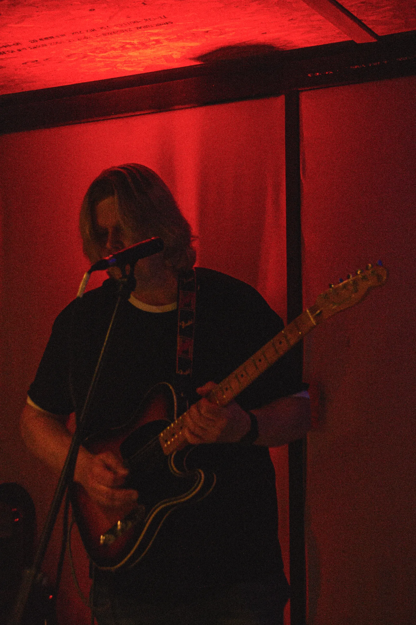 Mikko Malmivaara playing guitar